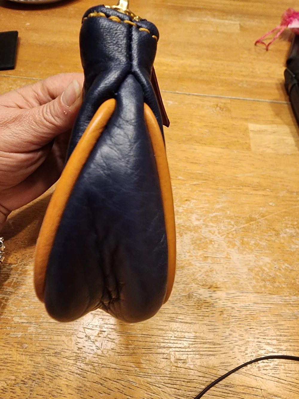 Dooney & Bourke Pebble Grain Slim Cosmetic slim pouch in navy blue Leather